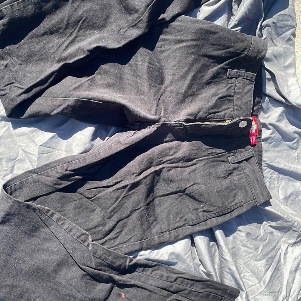 Dickies pants black with one bleach spot on back 0/24 size  sort of new